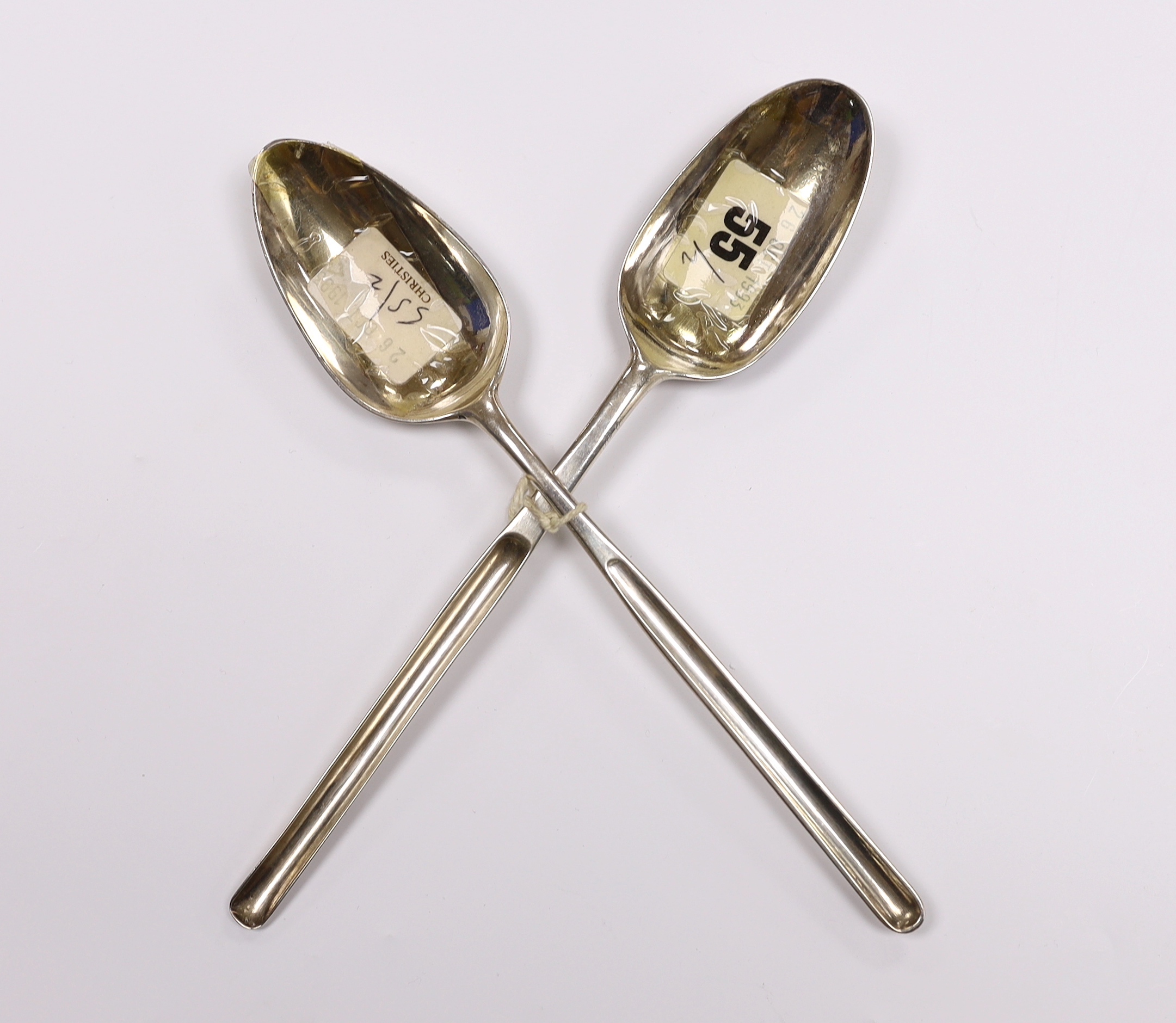 Two 18th century silver combination marrow scoop spoons, shell back by Samuel Roby, London, 1745 and Peter & Ann Bateman, London, 1792, longest 23.1cm, 113 grams.